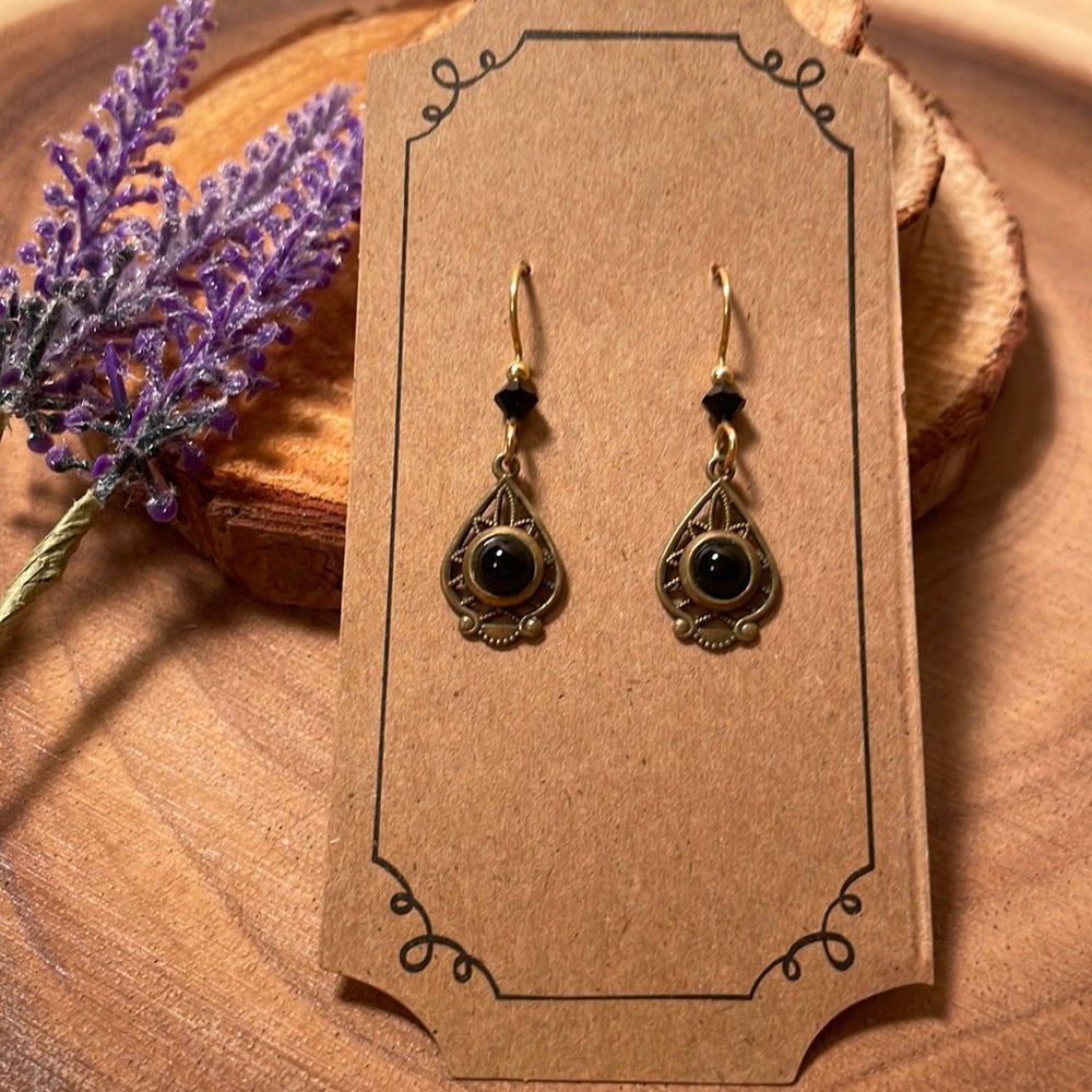 Women’s silver forest, gold and black onyx earrings
